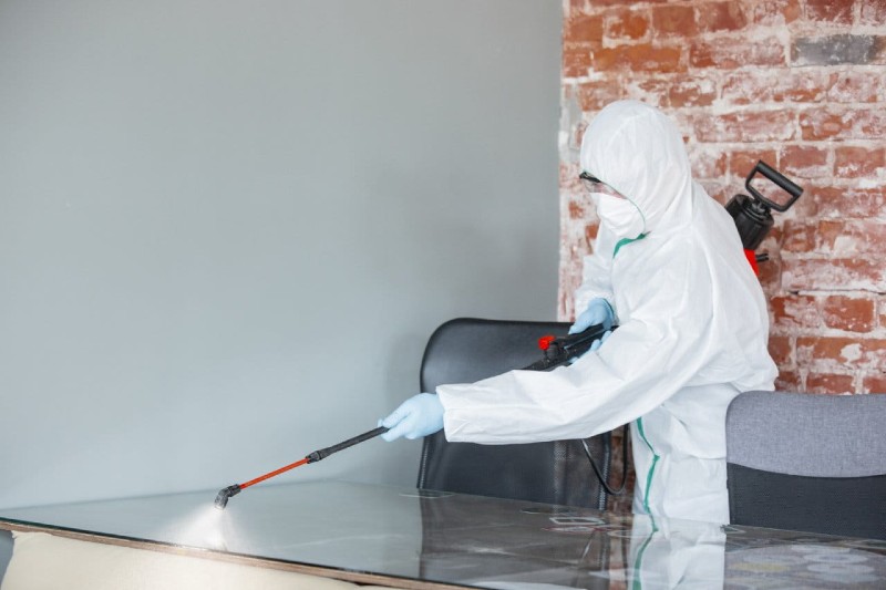 disinfecting surface at a commercial site